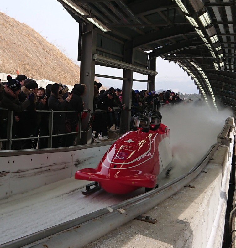 Enlarged view: Swiss four-men bobsled at finish